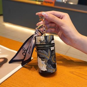 Embroidered bucket lipstick bag keychain pendant